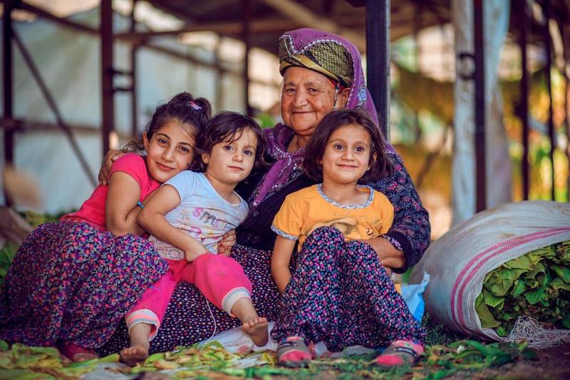 A grandmother with her grandchildren
